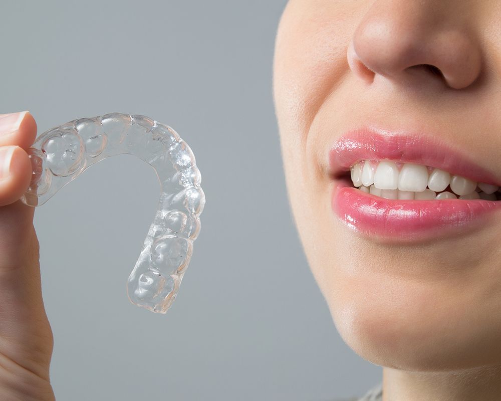 Patient using Invisalign clear aligners at Anderson Dental Group in China Grove, NC for orthodontic treatment.