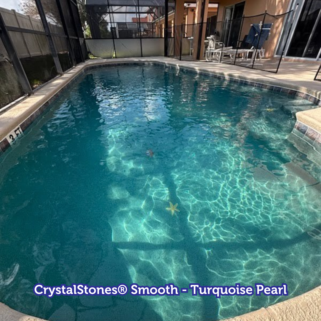 A turquoise pool with a smooth surface, surrounded by a screened enclosure and patio furniture.