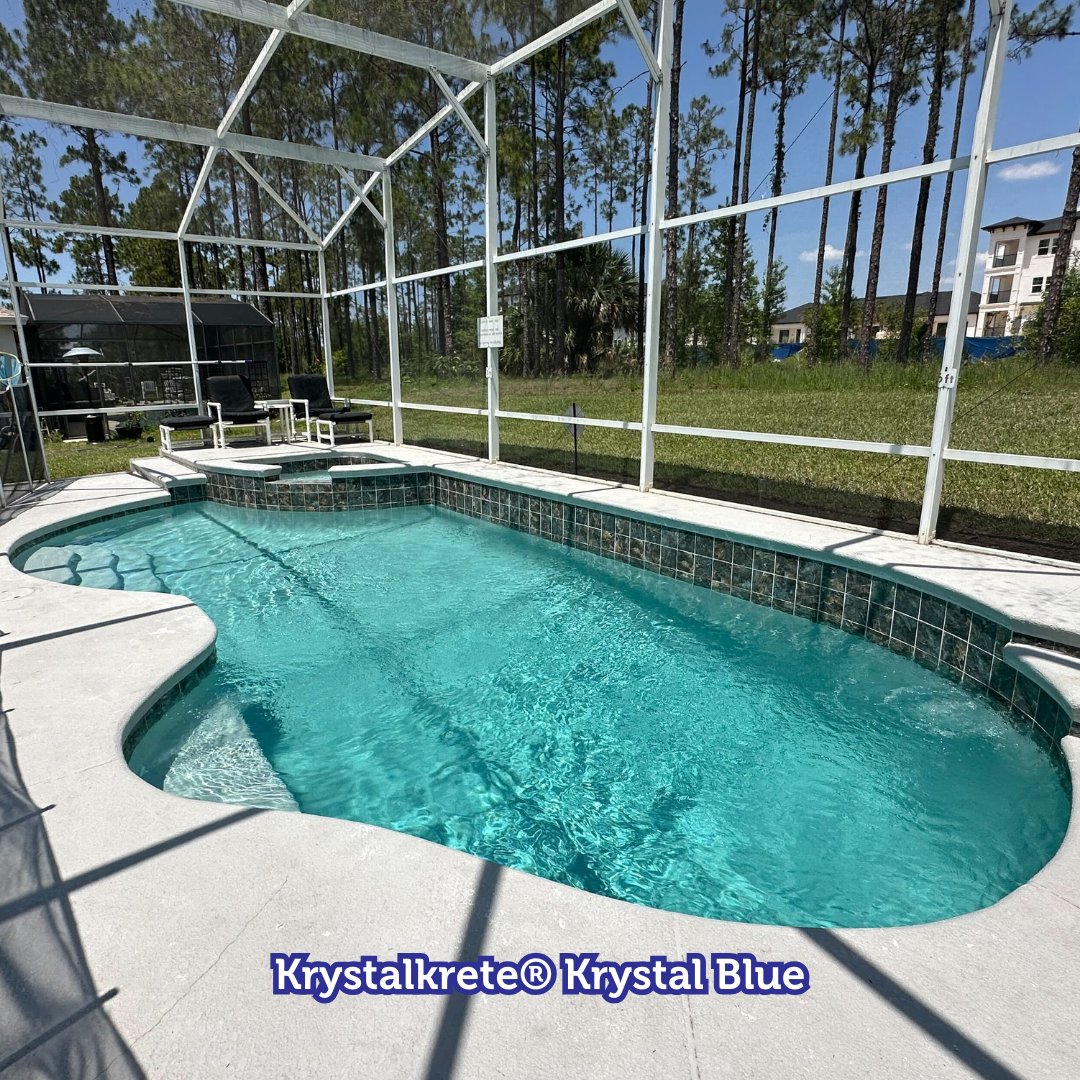 Swimming pool with turquoise water, screened enclosure, and sunny sky.
