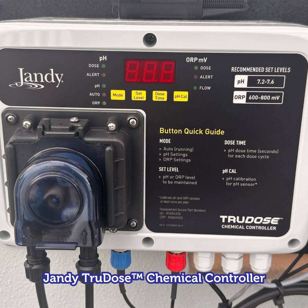 Jandy TruDose chemical controller. White box with digital display, buttons, and attached pump.