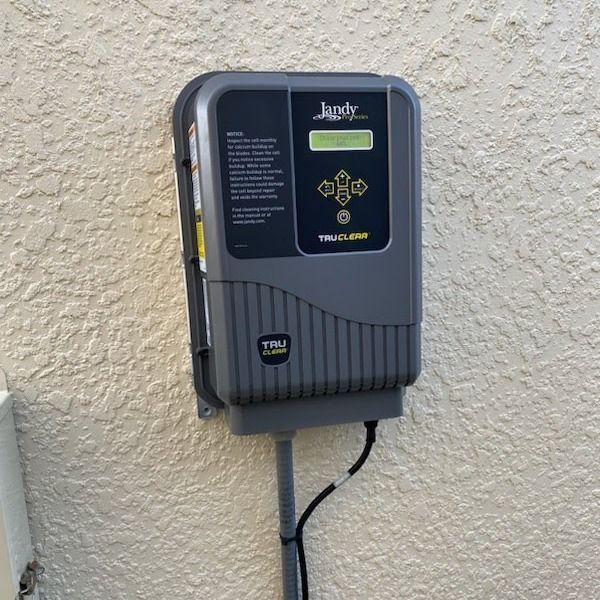 A janey device is attached to a wall