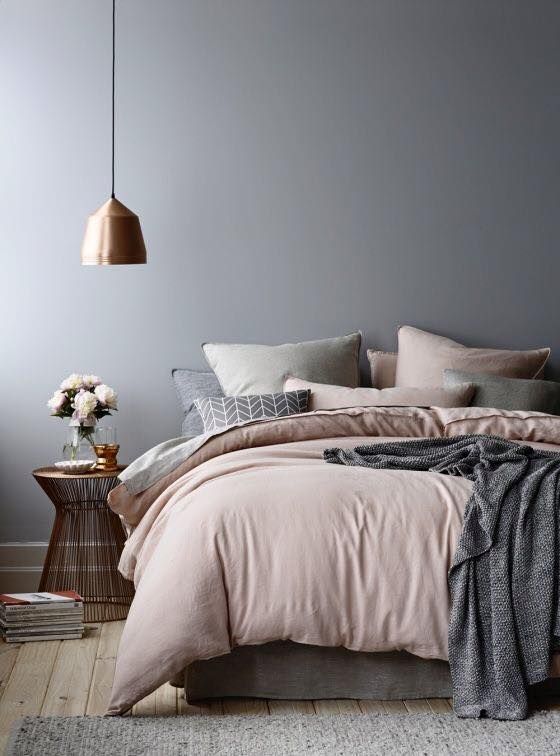 A Bedroom With A Bed, A Nightstand, And A Lamp — Aaron Lee Painting Pty Ltd In Thuringowa, QLD