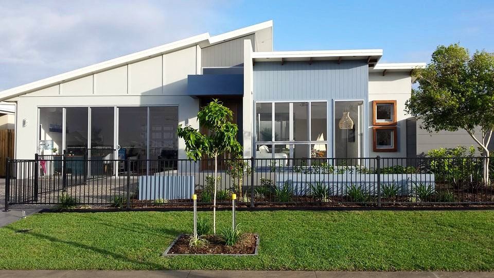 House With Blue Exterior Wall — Aaron Lee Painting Pty Ltd In Jensen, QLD