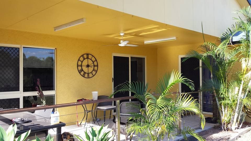 House with Yellow Coloured Exterior Wall