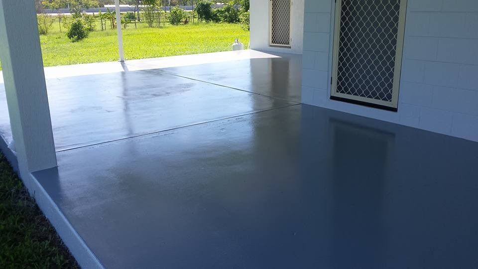 A Yellow House With A Ladder In Front Of It — Aaron Lee Painting Pty Ltd In Townsville, QLD