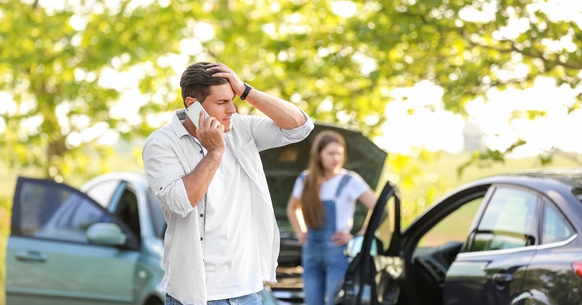 Man calling 911 after an accident