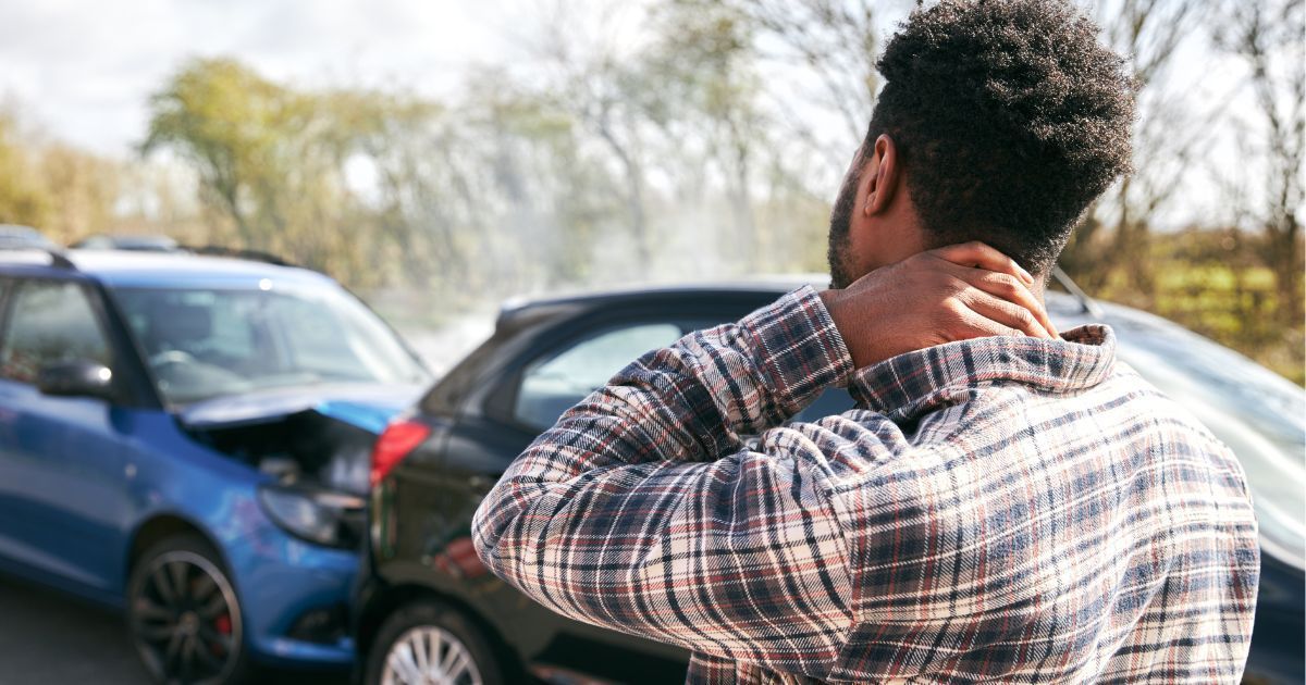 man experiencing whiplash
