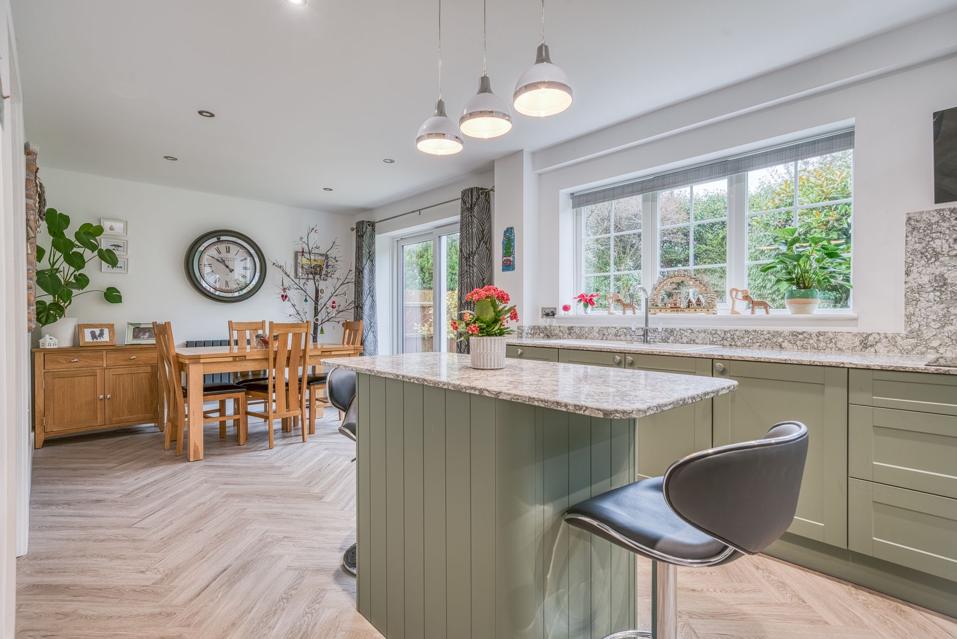 kitchen with olive cabinets and modern layout