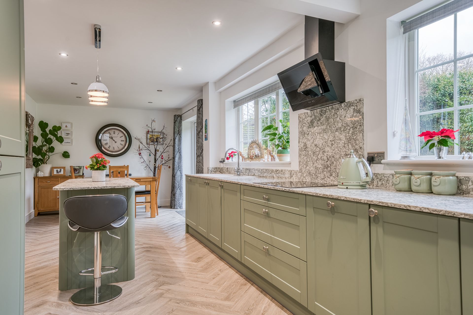 kitchen with olive cabinets and modern layout