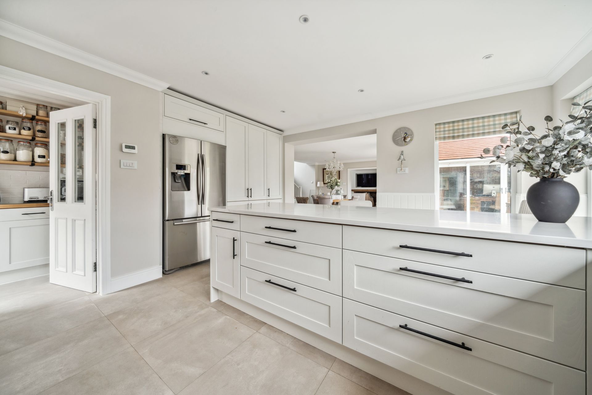 Modern kicthen with white cabinets and white worktop