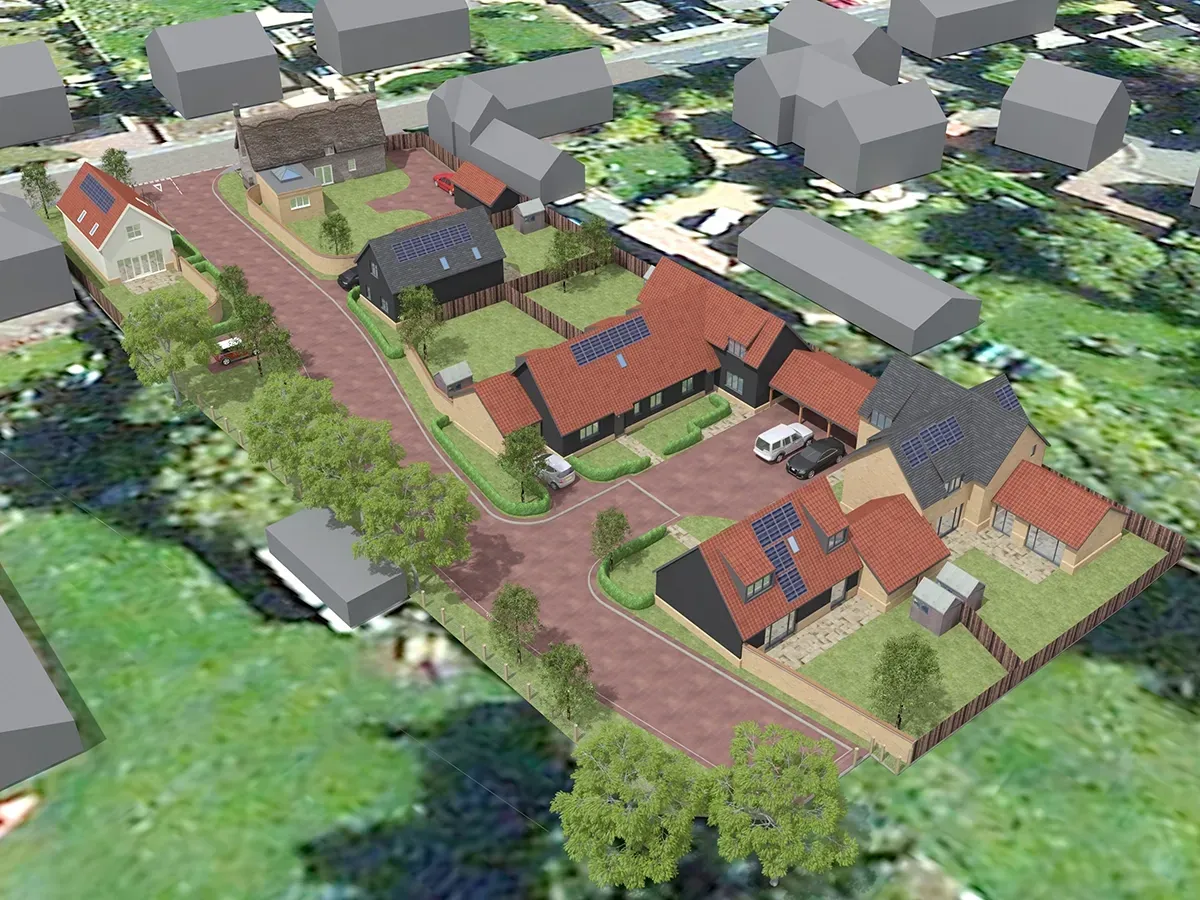 An aerial view of a residential area with lots of houses and trees