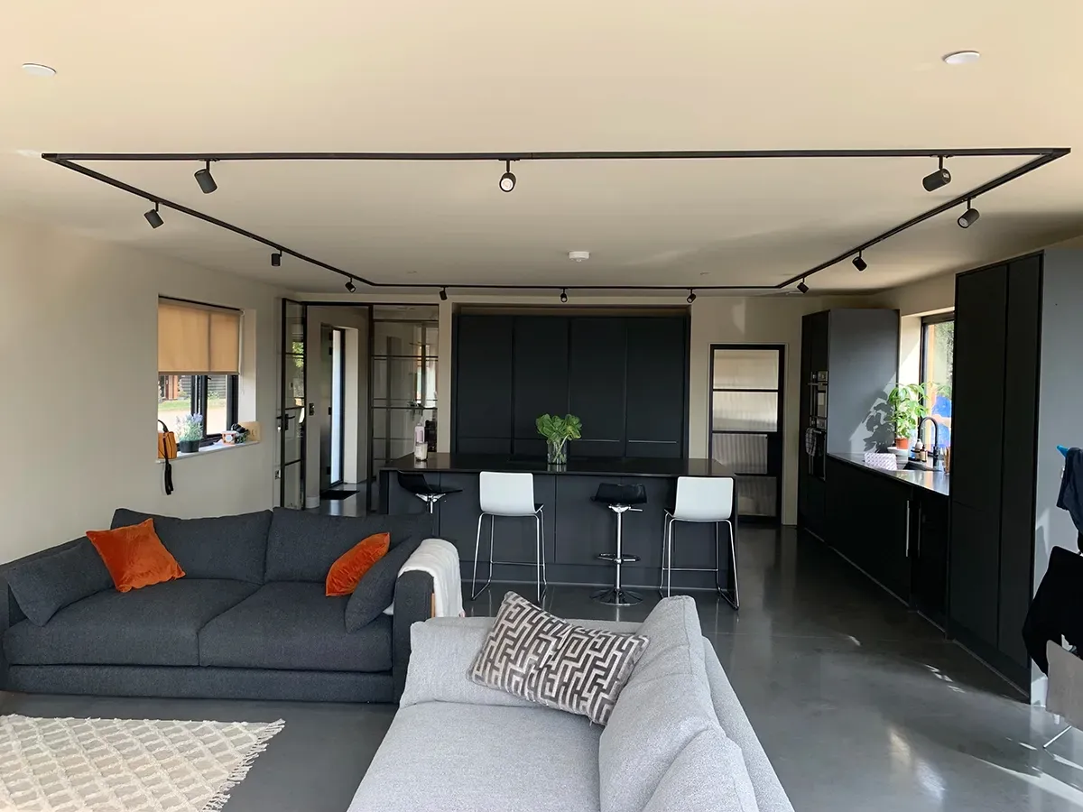 A living room with a couch and a chair in it