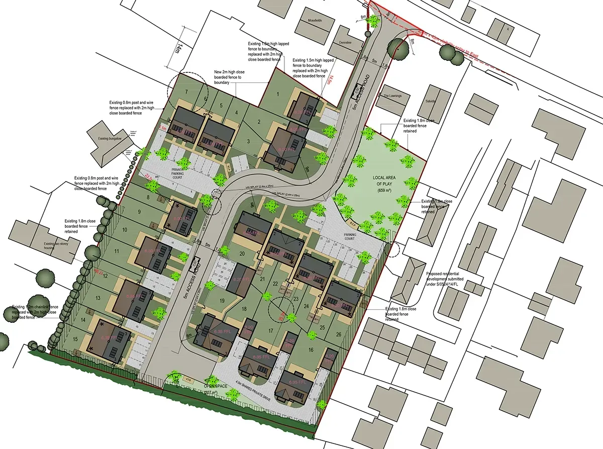 An aerial view of a residential area with lots of houses and trees