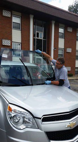 East Peoria — Man Installing The Windshield in Morton IL