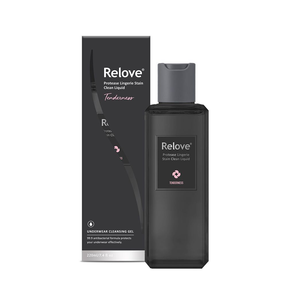 Relove 深灰色化妝瓶和配套的銀色裝飾盒。
