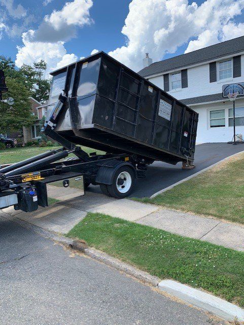 Two Large Garbage Compactors — Springfield, PA — J.M. Salgado Disposal Services
