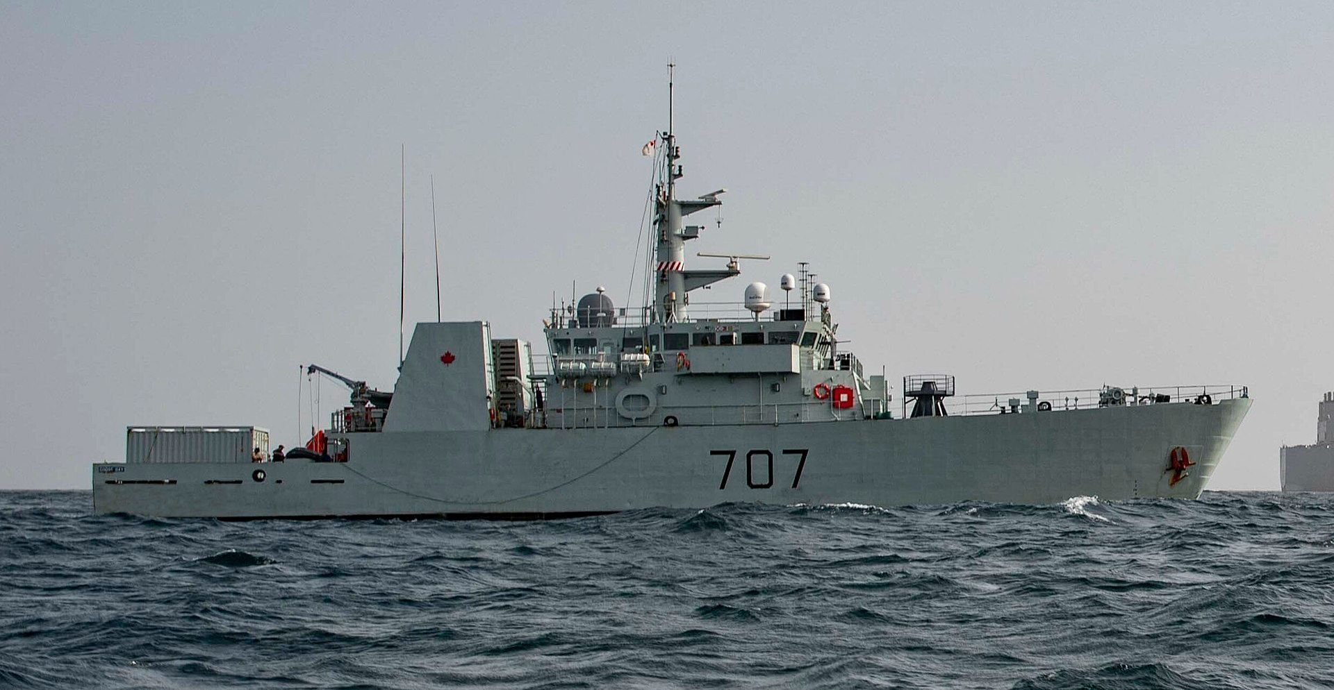 A large ship with the number 707 on it