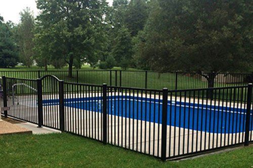 black fence around a residential pool
