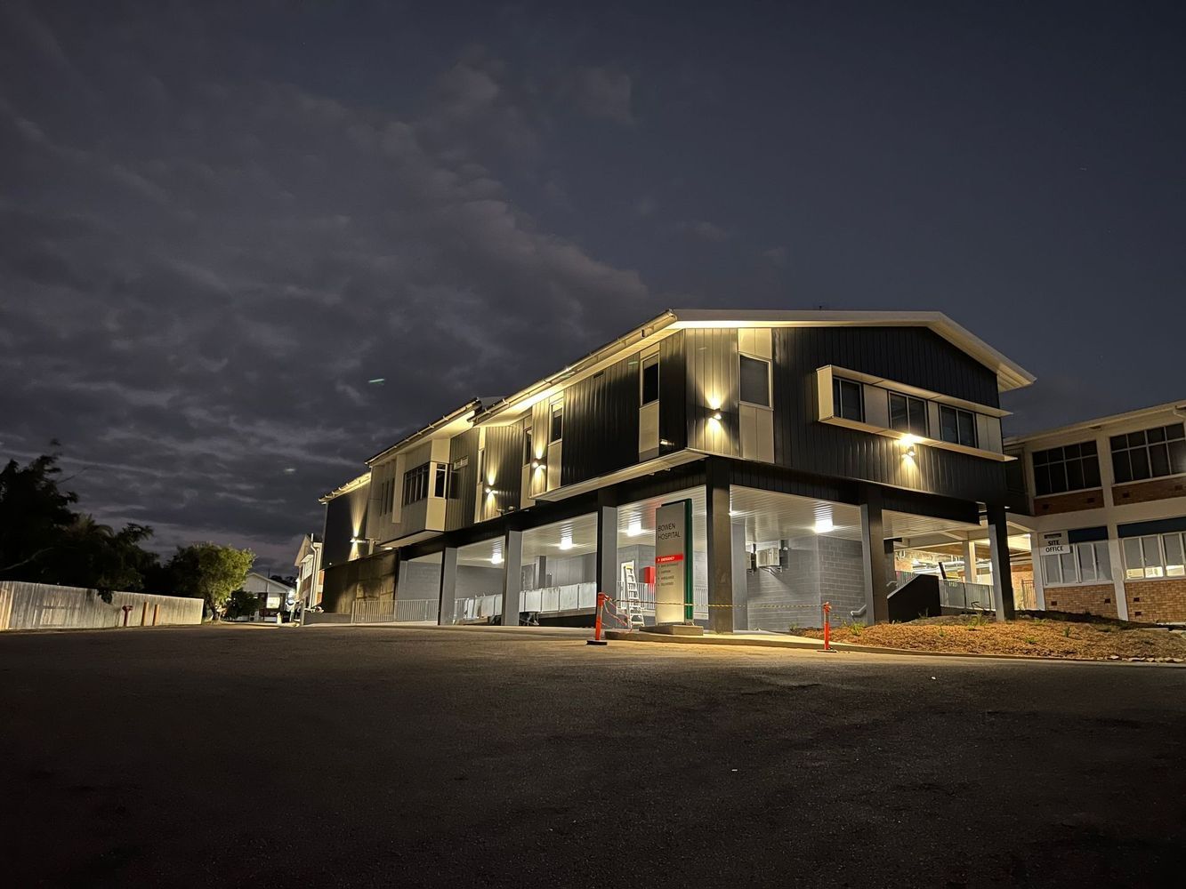 Tall Building Under Construction With Scaffolding Around — Proserpine Electrical Services in Whitsundays, QLD