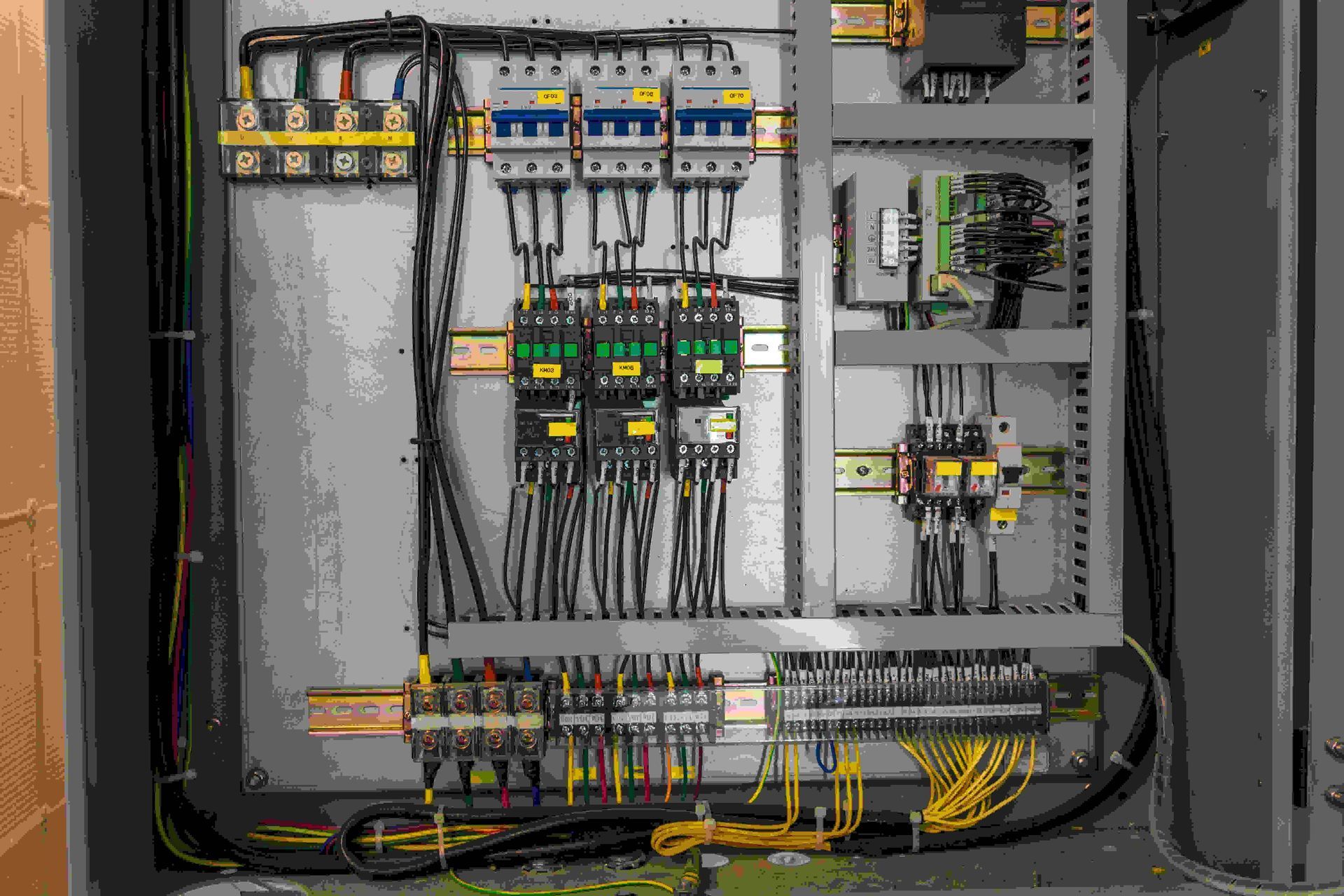 Close Up of a Electrical Panel With a Lot of Wires Coming Out of It — Proserpine Electrical Services in Proserpine, QLD