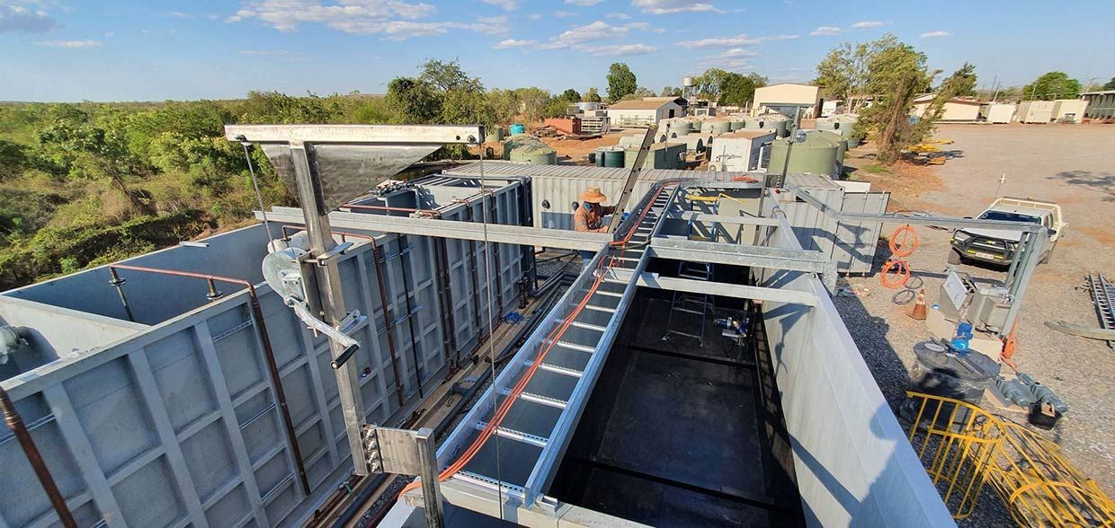 An Aerial View of A Large Metal Structure in A Field — Proserpine Electrical Services in Whitsundays, QLD
