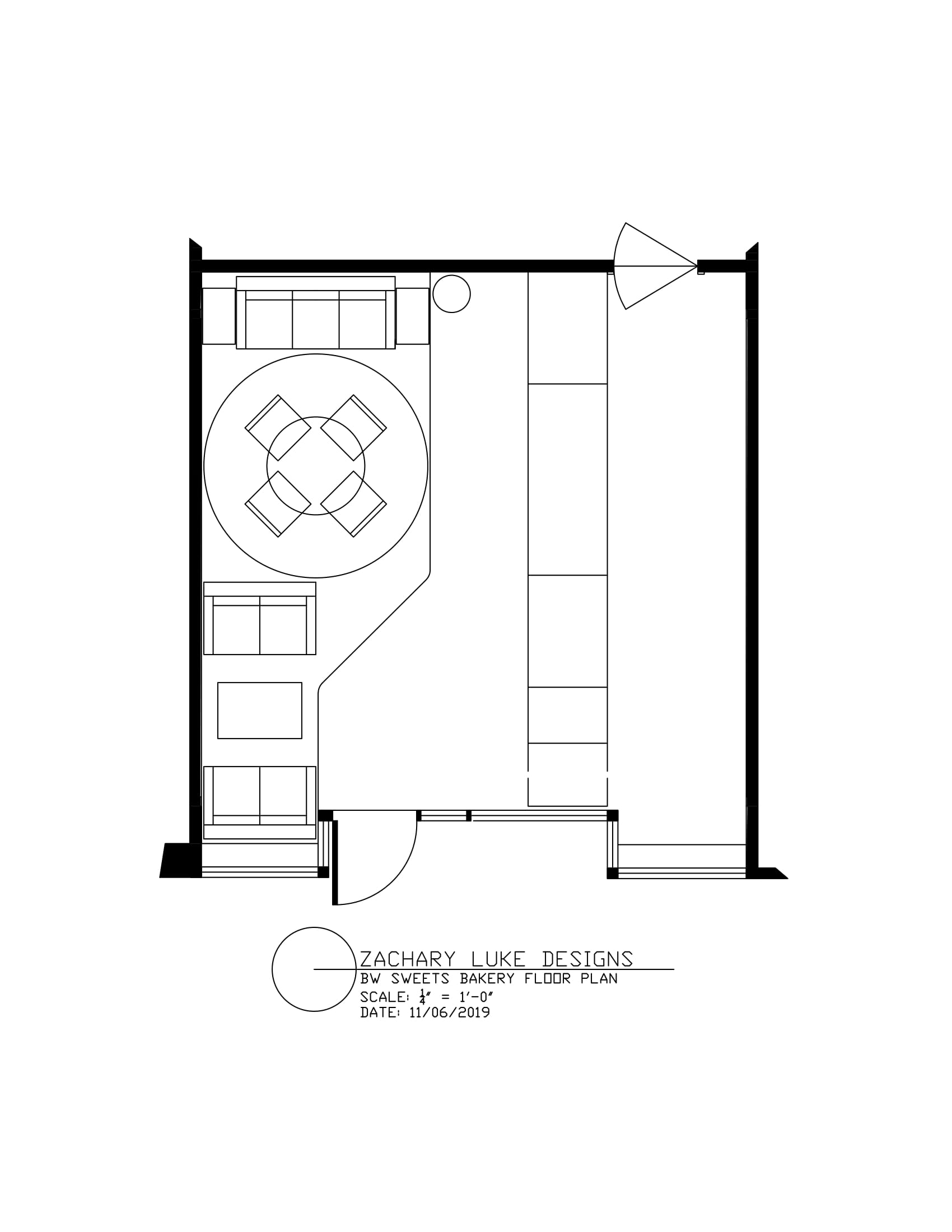 Floor plan of a room with a circular table, chairs, shelves, a door, and a triangle-shaped symbol.