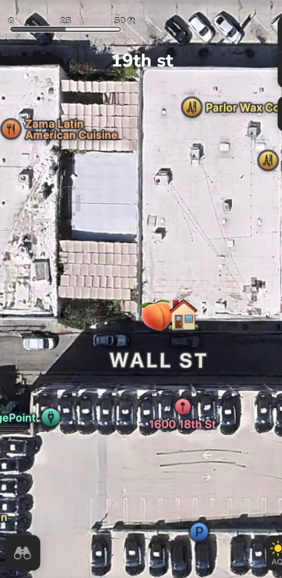 Overhead view of buildings, streets, and parked cars, with Wall St. and 19th St. marked.