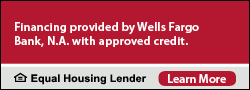 A red sign that says financing provided by wells fargo bank n.a. with approved credit