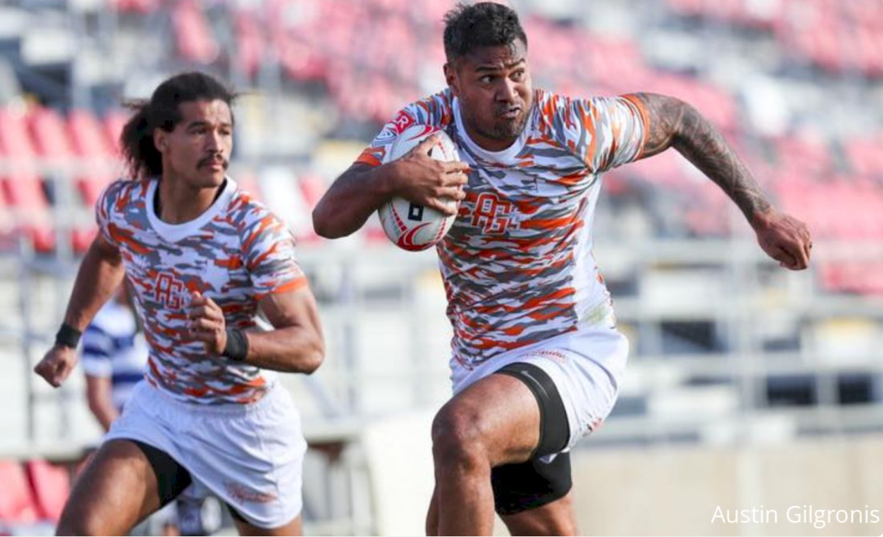 MLR Rugby player runs with the ball