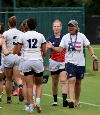 Women rugby players congratulating each other
