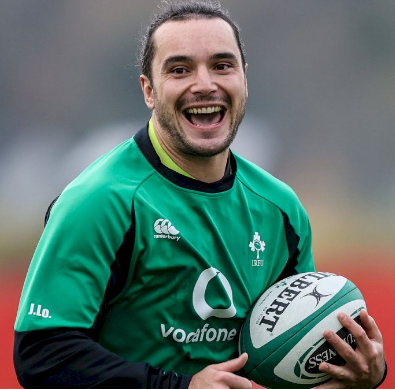 Smiling man playing rugby