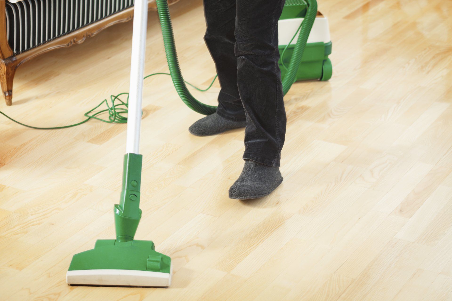 Carpet Cleaning — The Cleaner Used the Vacuum To Clean A Floor in Omaha, NE