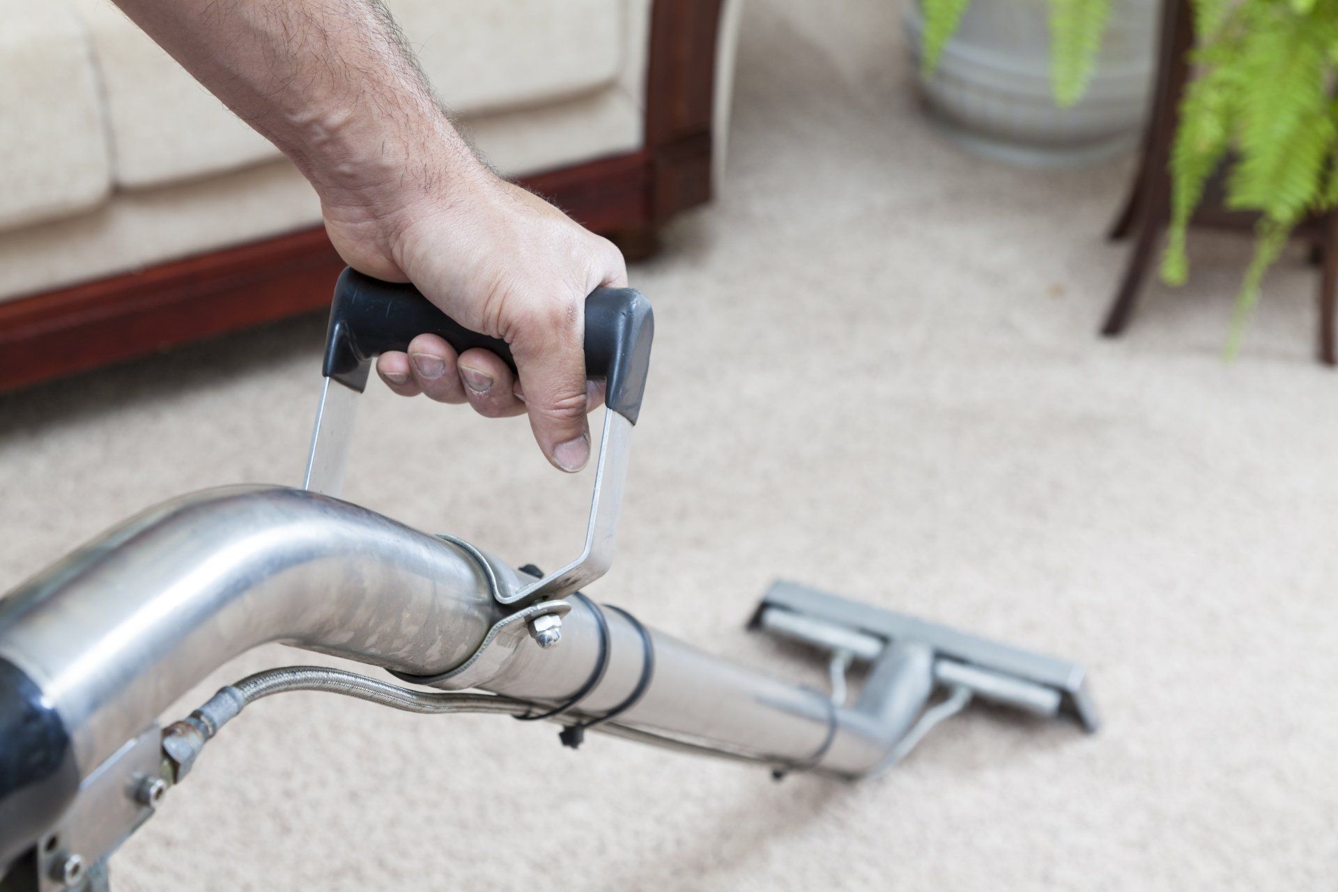 Carpet Restretching — The Cleaner Used Vacuum To  Clean A Carpet in Omaha, NE