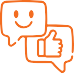 Two speech bubbles with a smiling face and a thumbs up.