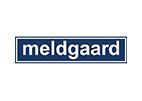 A blue sign with the word meldgaard on it. - 
Se imponerende før- og efterbilleder af vores rensede facader og fliser i Sønderjylland. Algerens, algebehandling, facaderens, fliserens.