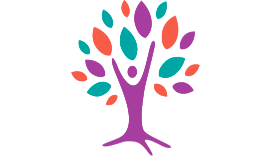 A colorful tree with a person standing in the middle of it.