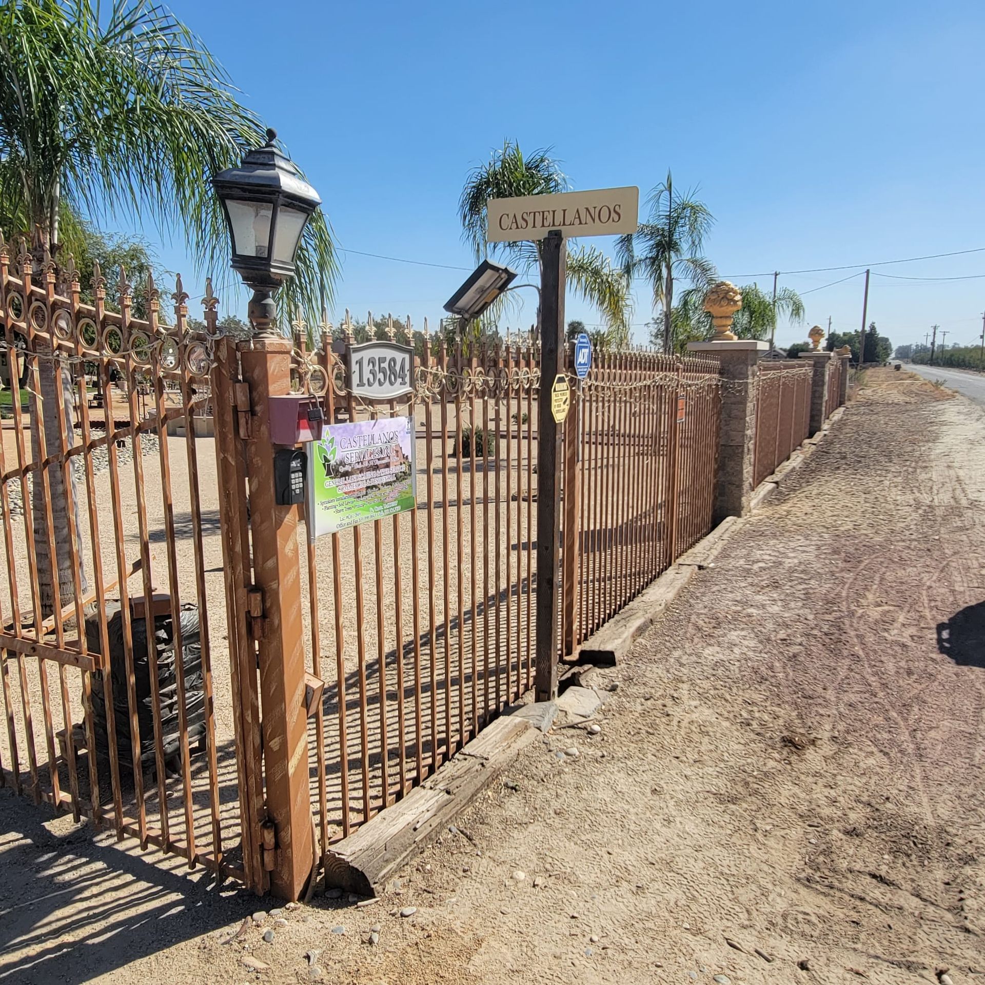 A wooden fence with a sign that says 1554