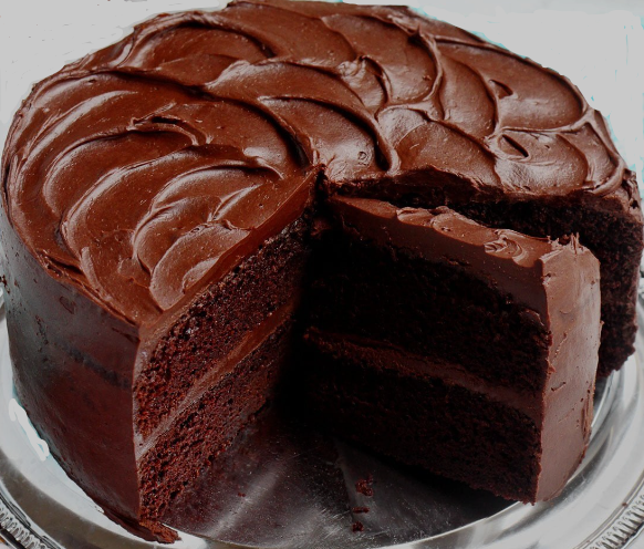 Chocolate cake, three-layer with dark frosting, slice removed.