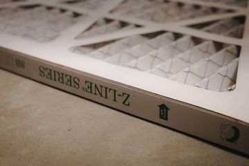 Close-up of a Z-Line Series air filter with an arrow indicating airflow direction.