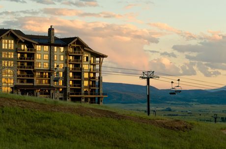 Hotel and ski lift durning sunset at summer. This is in Steamboat Colorado.