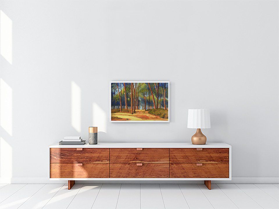 California artist John Kosta's painting entitled Sardenia Bay Pine Forest presented in a stylish mid-century modern living room.