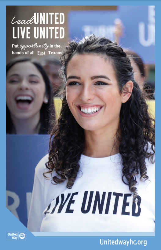 a woman wearing a white shirt that says live united