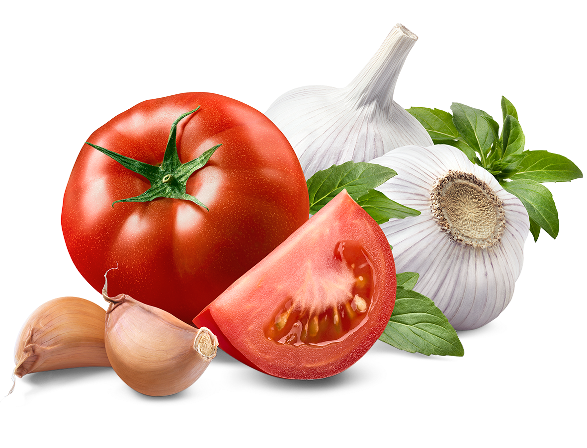 a tomato garlic and onion on a white background