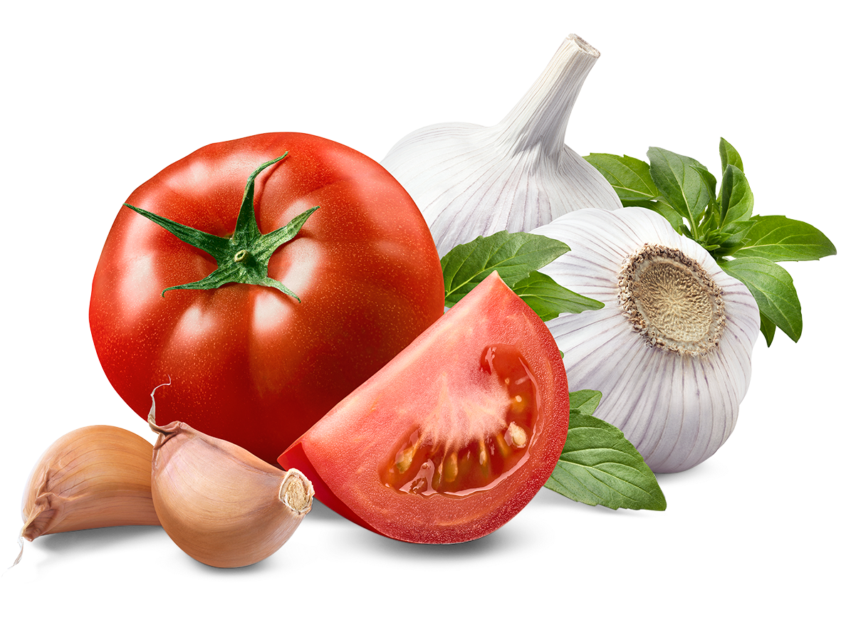 a tomato garlic and onion on a white background