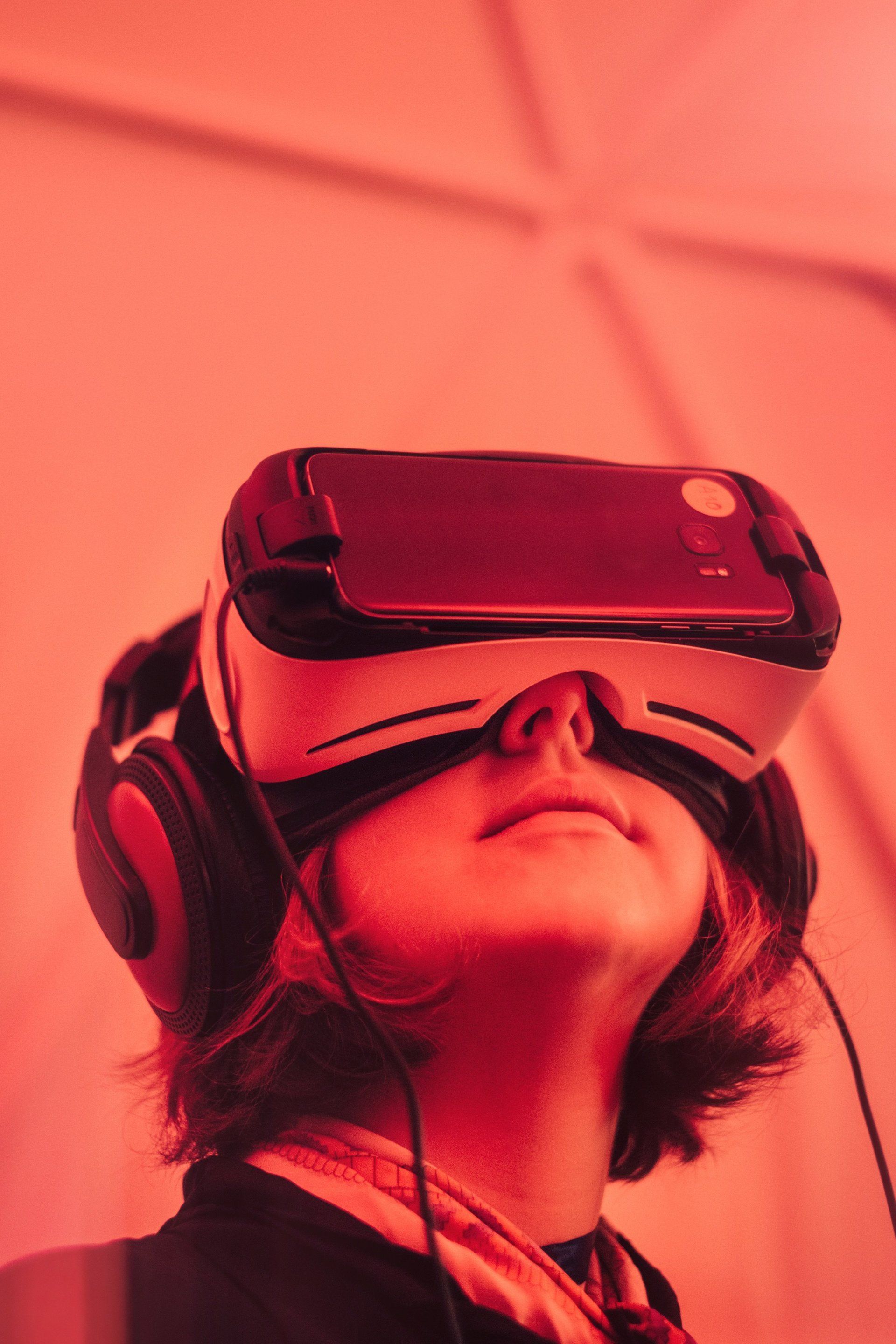 Woman watches a DC Visionaries 360 VR video production