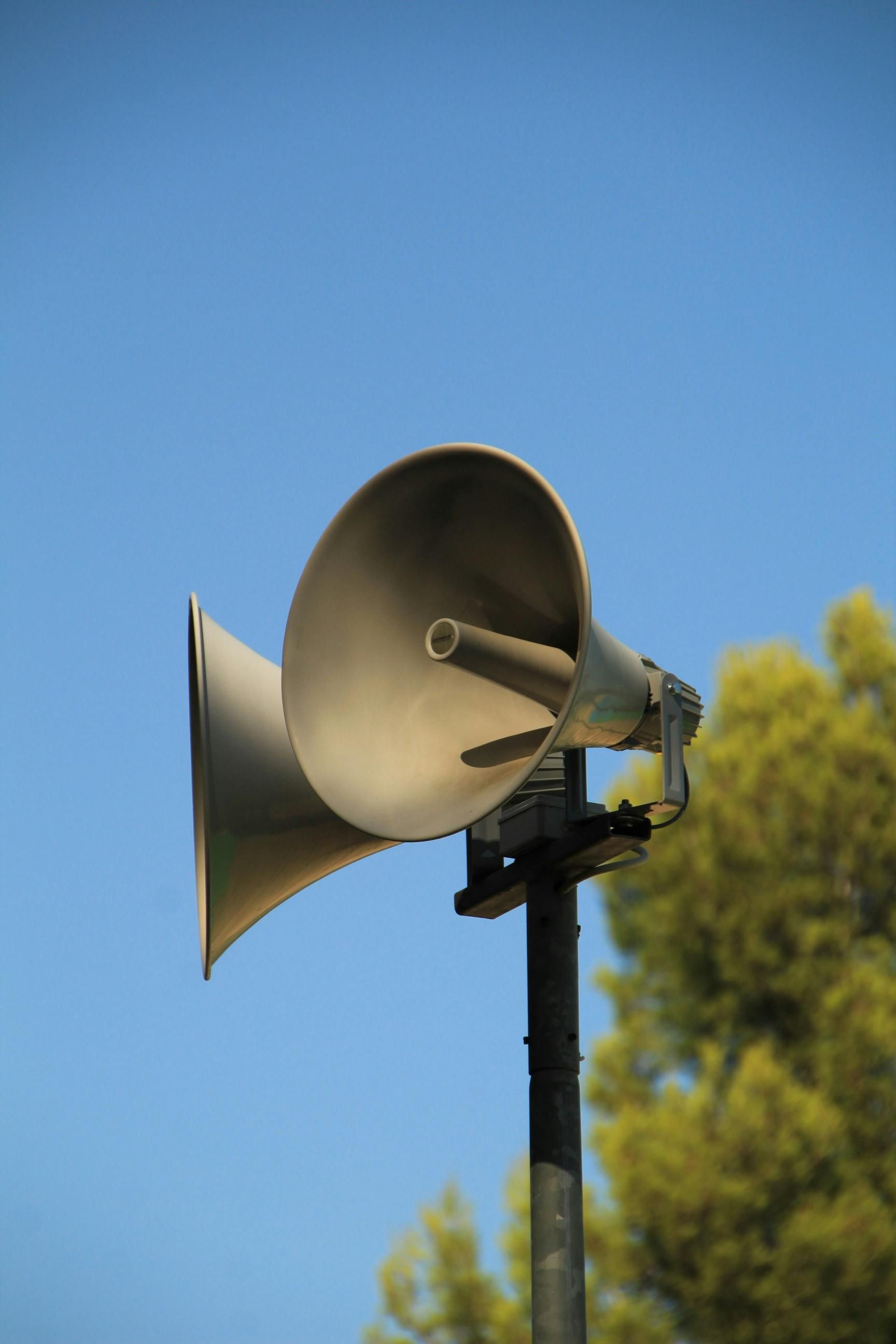 Two Speakers on a Pole With a Blue Sky in the Background — Audiomation in Nabiac, NSW