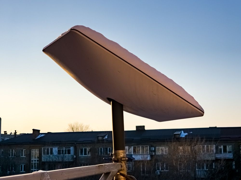 A Satellite Dish is Sitting in Front of a Building — Audiomation in Old Bar, NSW