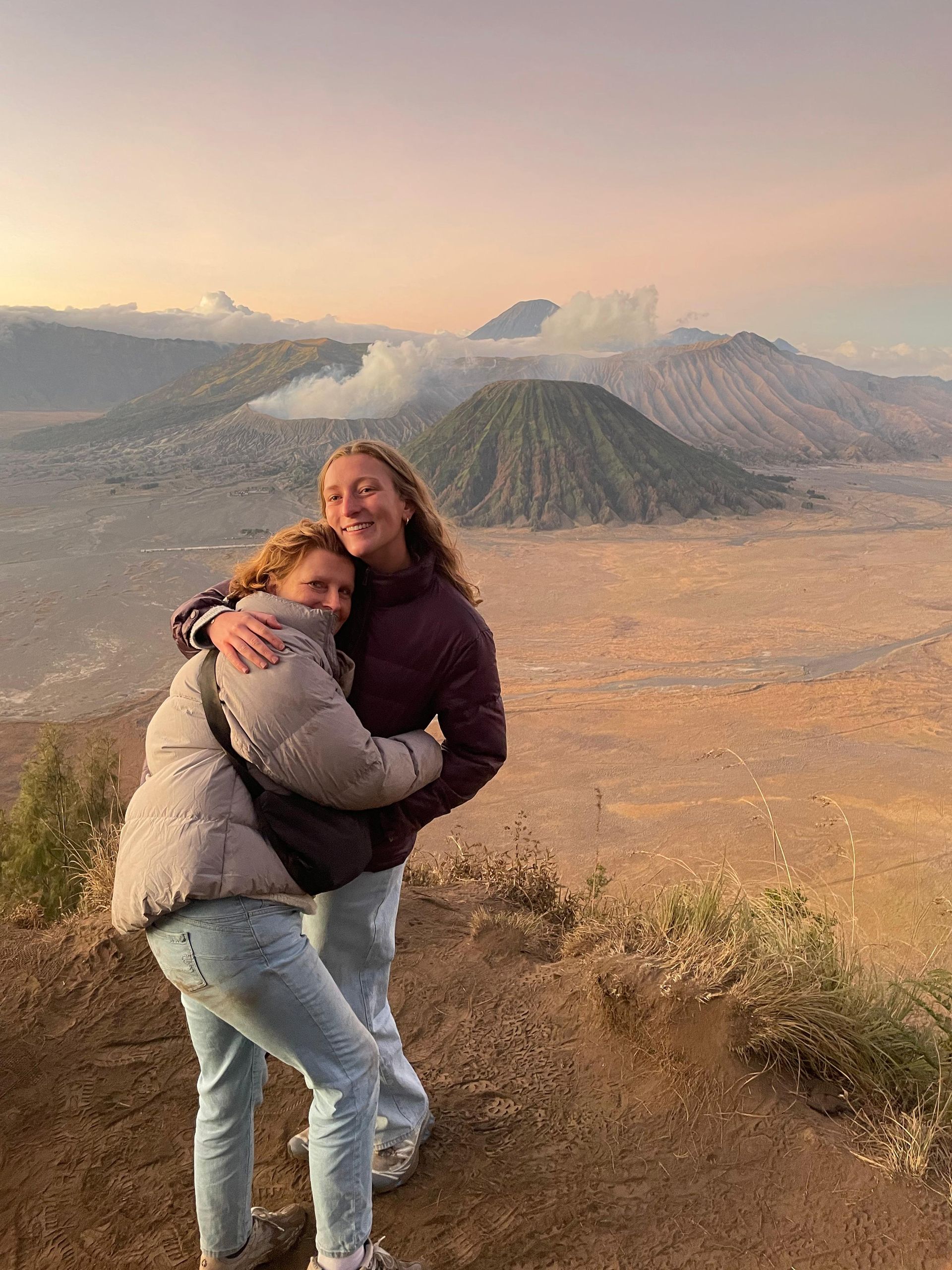 A tourist enjoy sunrise in mt bromo