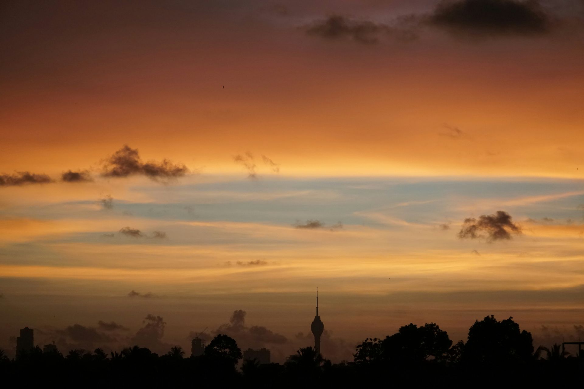 Panoramic view of Borobudur during sunrise, highlighting its spiritual ambiance