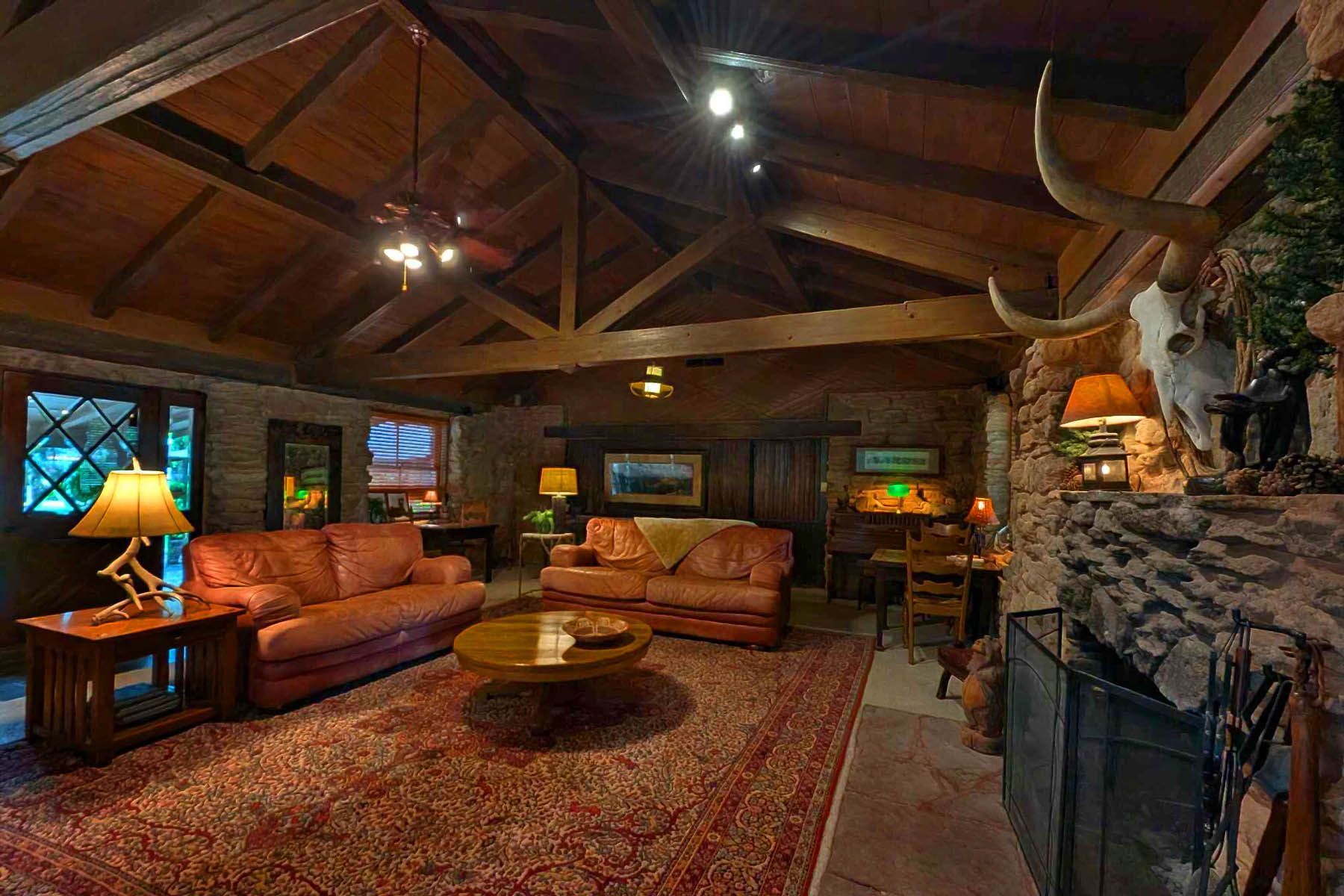 A living room filled with furniture and a fireplace.